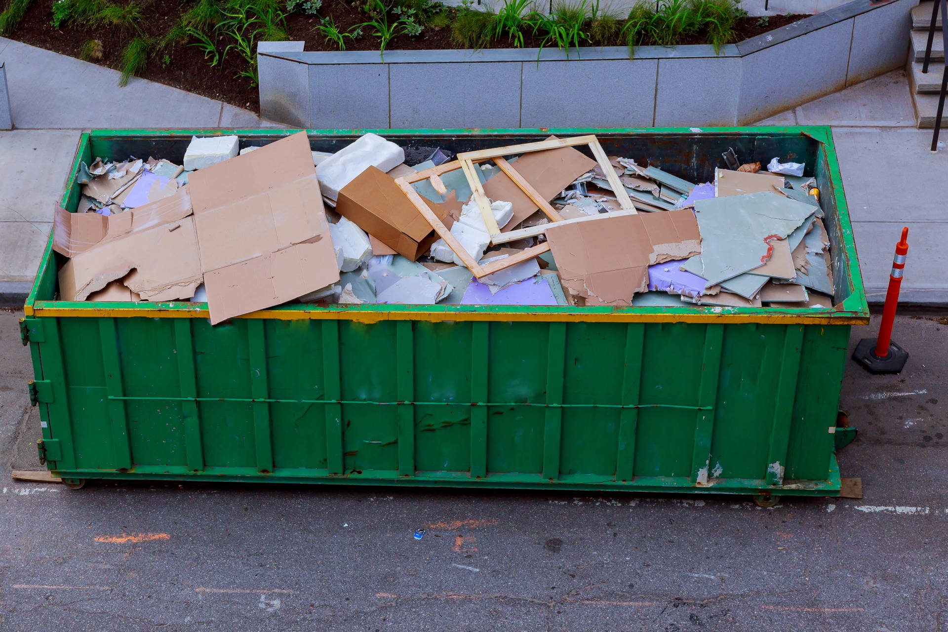 A full bin outside a business