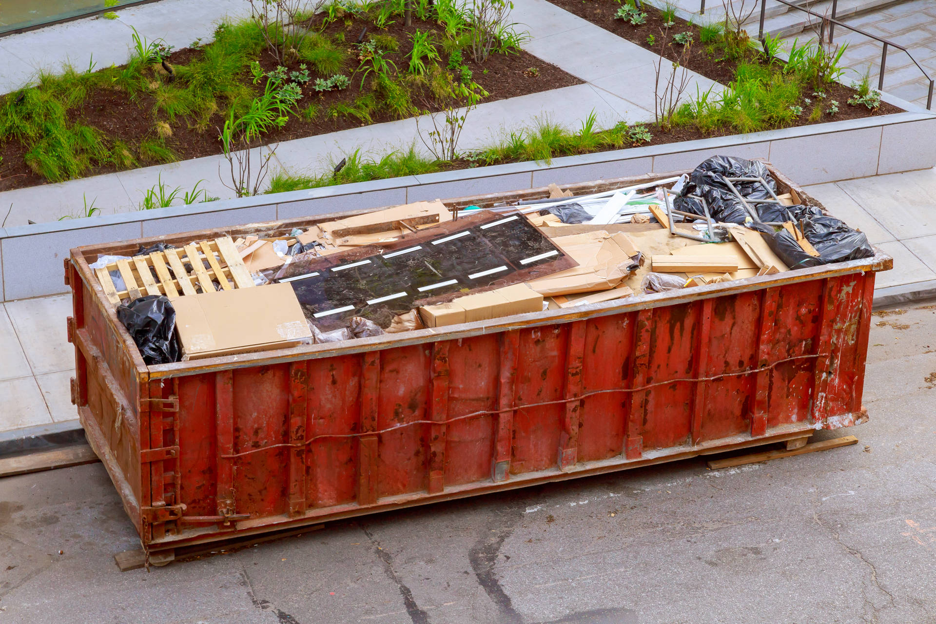 A bin full of construction debris