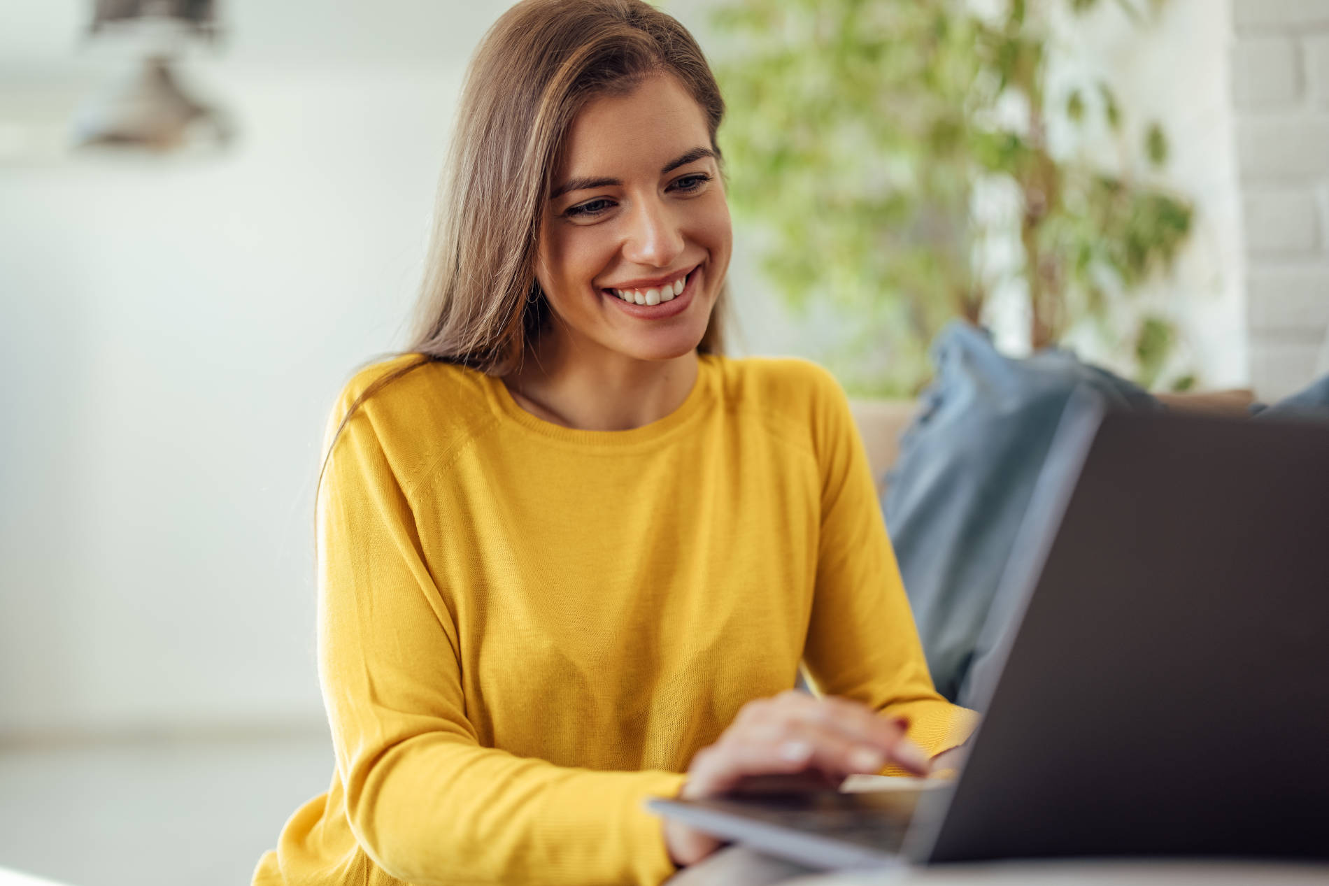 A woman using a laptop